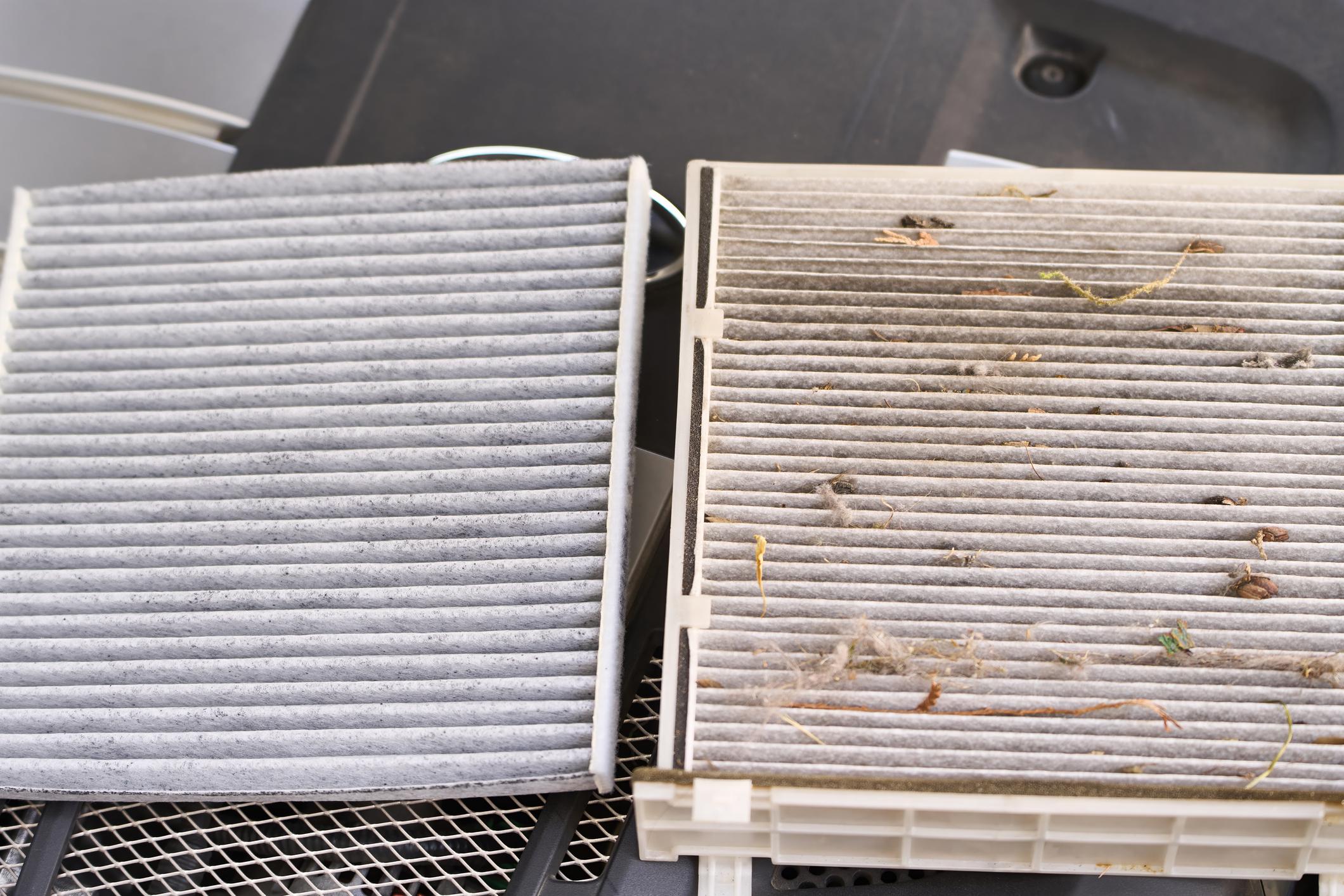 Air conditioner running but not cooling showing frozen coil and dirty air filter example